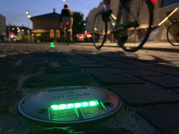 TrafficLED ground light from GIFAS with green light improves visibility for cyclists at night