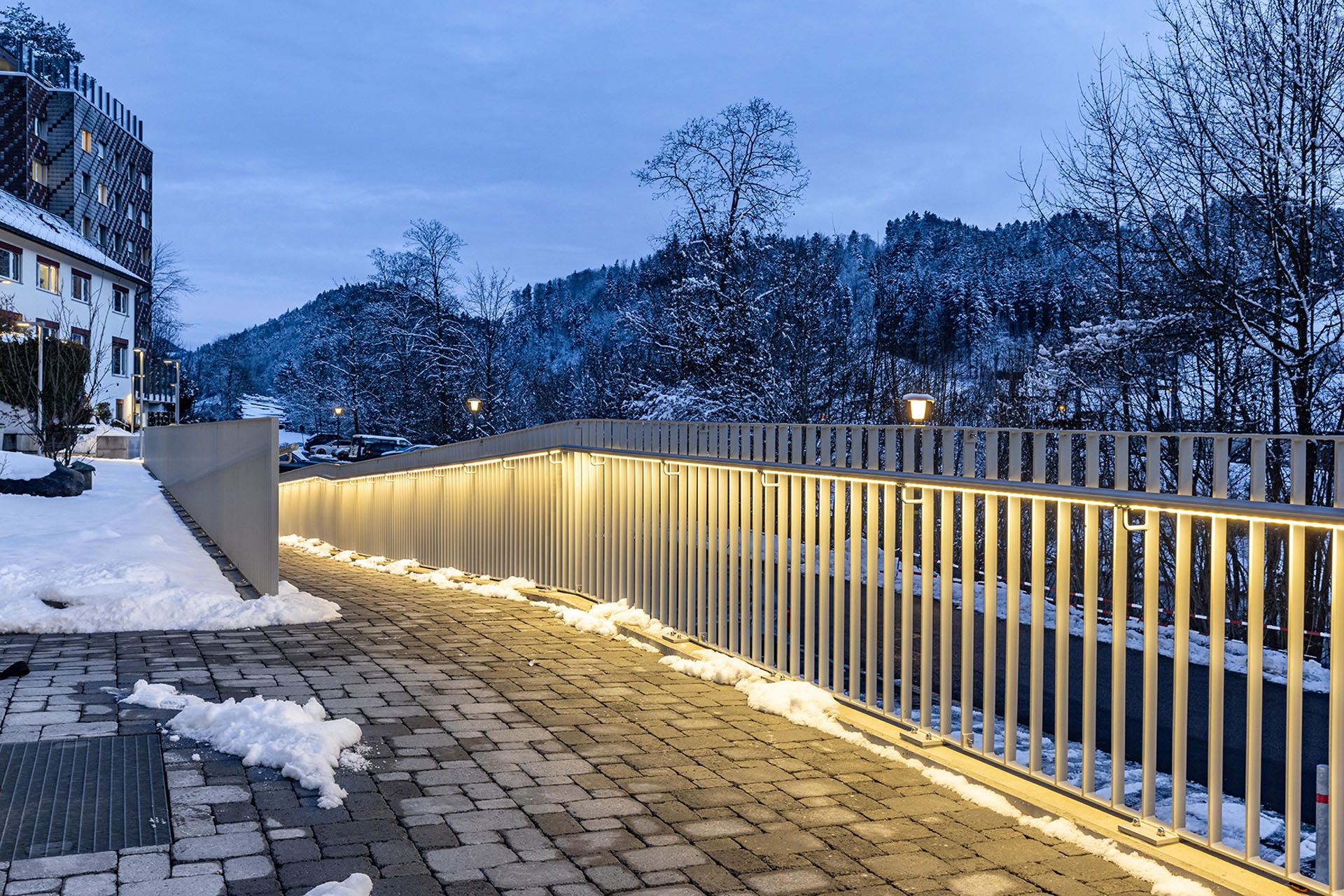 LaneLED INOX LED handrail lighting along a walkway for safe and uniform illumination in outdoor areas