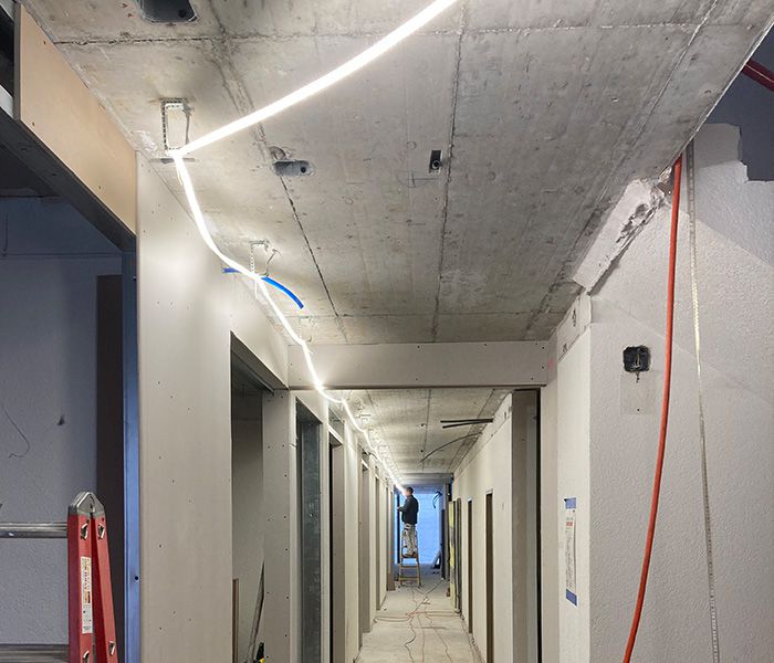 Construction site lighting in the electrical industry - FlexLED strip lighting for interior work in Oensingen