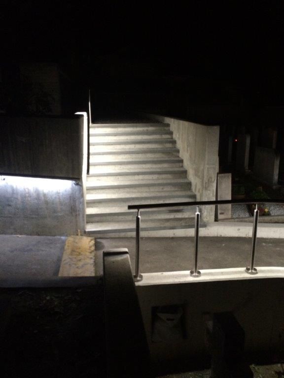Illuminated stairs with LED light for safe guidance at night at Glis cemetery
