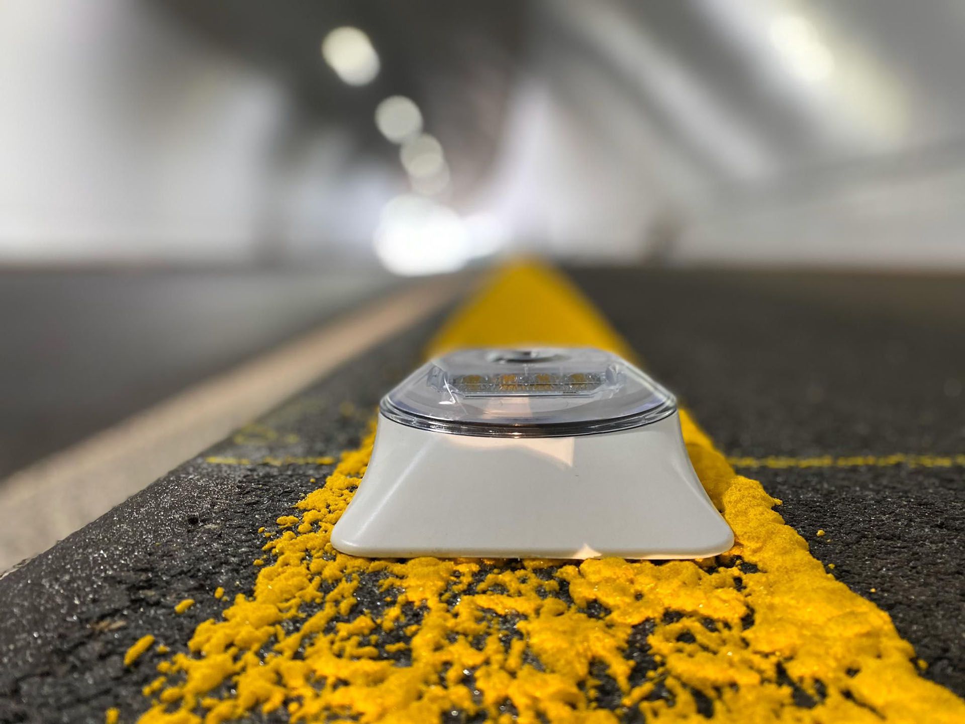 MarkLED ground light on the yellow road marking in the tunnel ensures precise visibility and safe traffic guidance