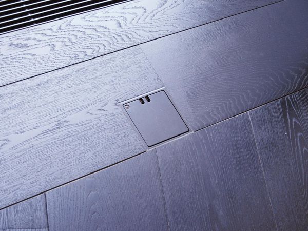 Fontino floor socket in the Serlachius Museum - elegant GIFAS solution for discreet power supply in wooden and interior floors