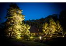 VisuLED garden lighting impressively sets the scene for large trees, ponds and house facades and creates an atmospheric ambience at night
