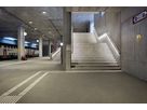 Station stairs with integrated LED handrail lighting and clear routing - safe orientation in the platform area