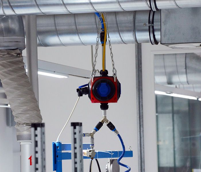 Overhead distribution board in the electrical industry - mobile power distribution in a workshop with CEE connections