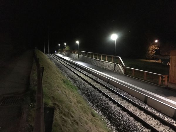 LED station lighting at night with GIFAS STREETLED CUBE - uniform and energy-efficient illumination of the platform