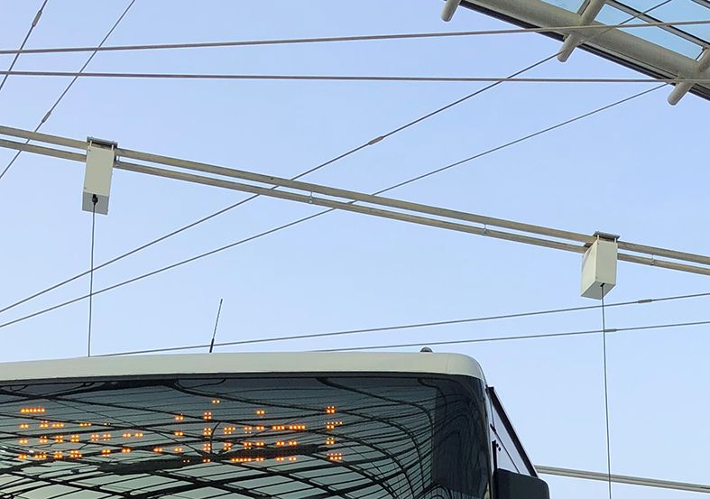 Close-up of the train cable reels above bus stands at the Chur Postdeck to supply power to the vehicles