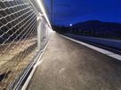 Inox42 handrail with integrated LaneLED lighting provides safe guidance along the platform at dusk