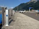 Energy columns from GIFAS along the harbor wall in Brunnen - efficient power supply for boats and harbor operations