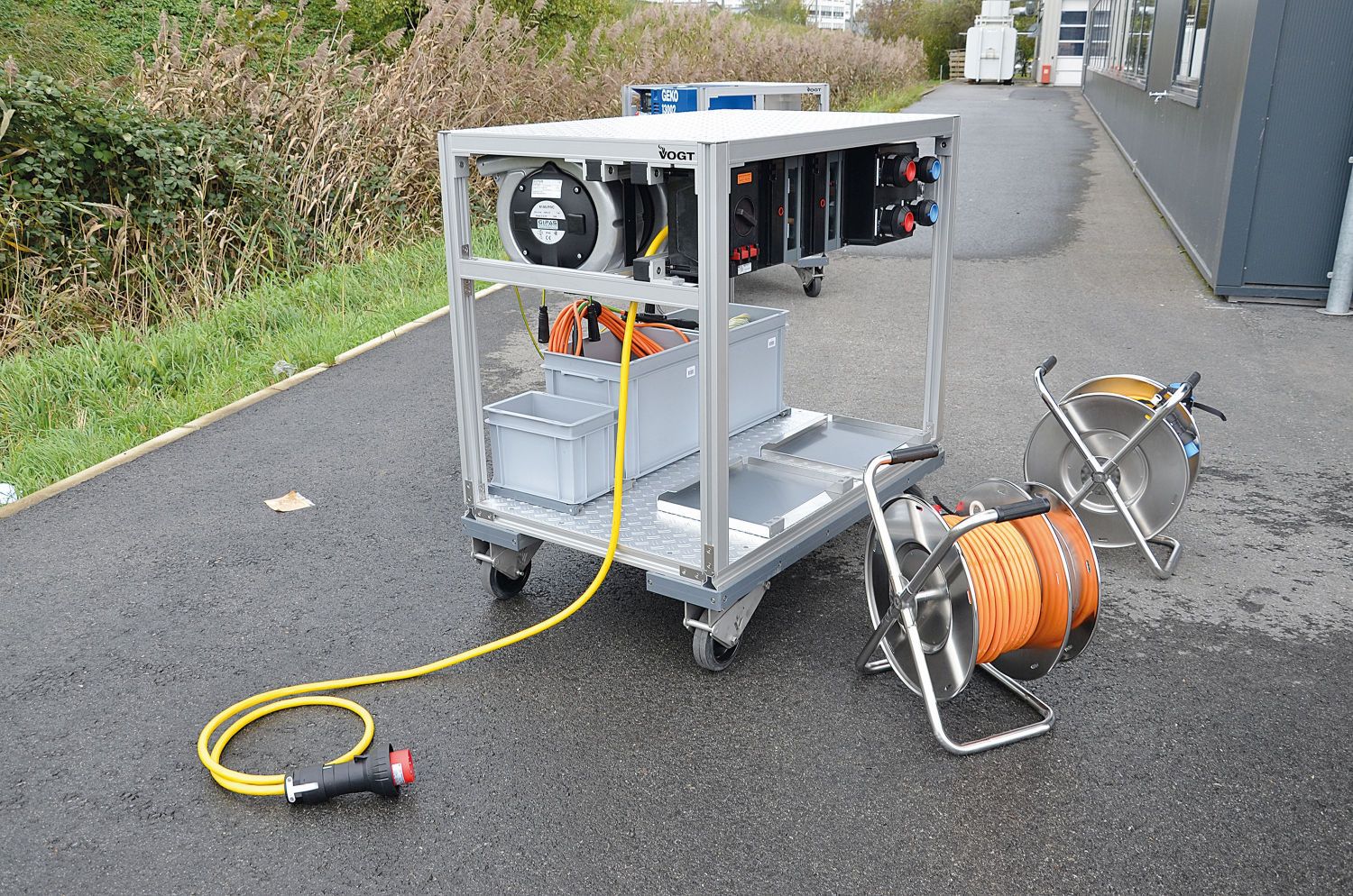 Mobile fire department distribution trolley with connected cable reels - safe power supply for emergency and rescue operations
