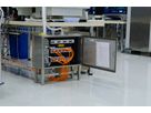 Impianto elettrico nel laboratorio di Goldach con quadro aperto, scatole di derivazione a parete e cablaggi visibili