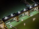 Dam at night with integrated LED lighting for safe illumination of walking and maintenance areas