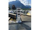 Stainless steel energy column in the Brunnen marina - secure power supply for boats and harbor facilities with GIFAS technology