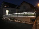 Illuminated railing with GIFAS LaneLED INOX42 at the Xundheitszentrum Stein am Rhein - energy-efficient LED path lighting for greater safety