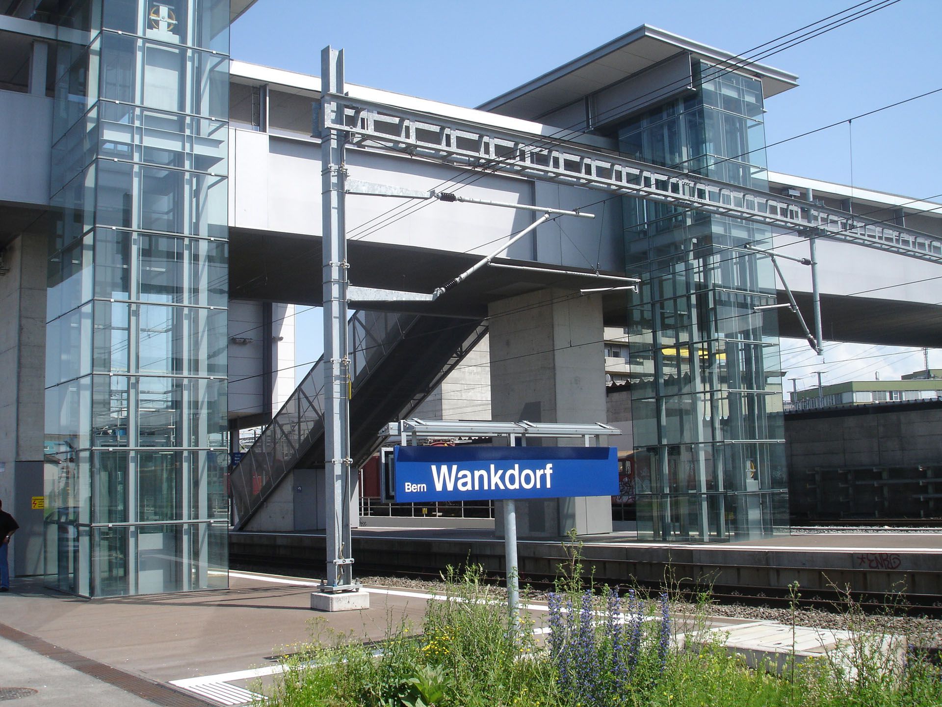 Bern Wankdorf station with modern architecture and security lighting installed on the platforms