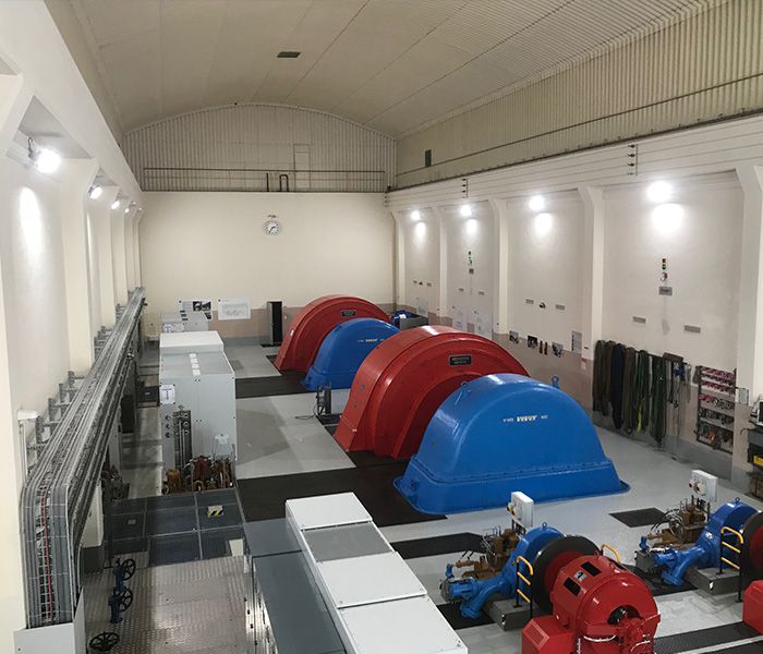 Industrial luminaires in a hydroelectric power plant for safe lighting of the technical infrastructure and energy supply
